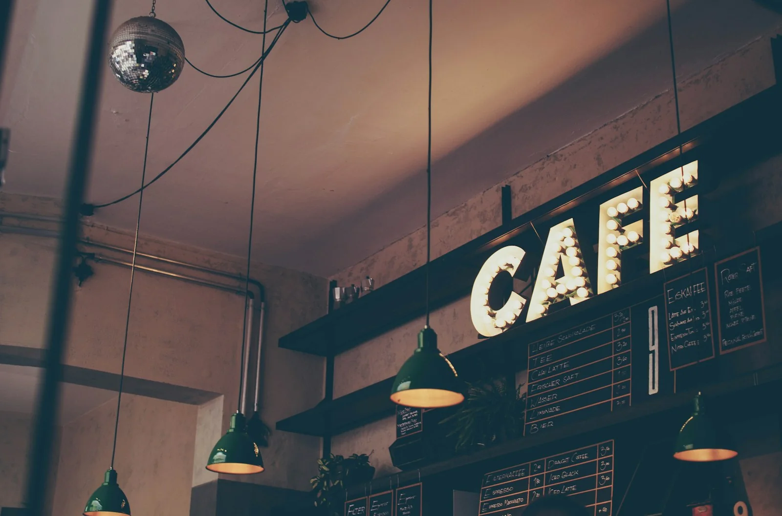 Warm atmospheric cafe illuminated by glowing lights